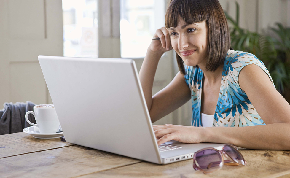 Woman with laptop computer tracking her order